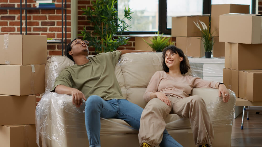 couple taking a break from moving